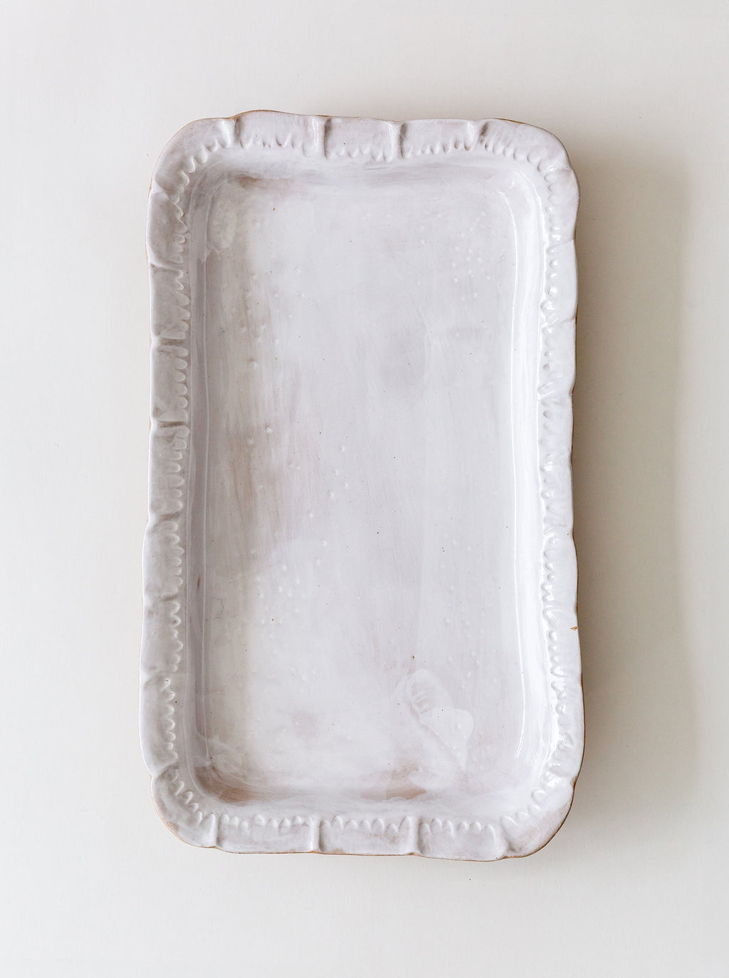 Plateau à bords ondulés