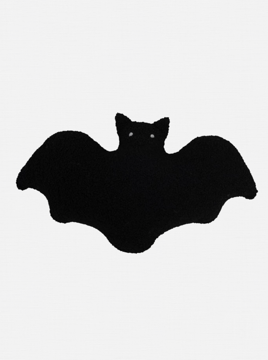 Oreiller chauve-souris en sherpa