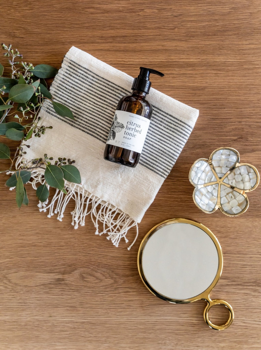 Lotion corporelle tonique aux agrumes et aux herbes