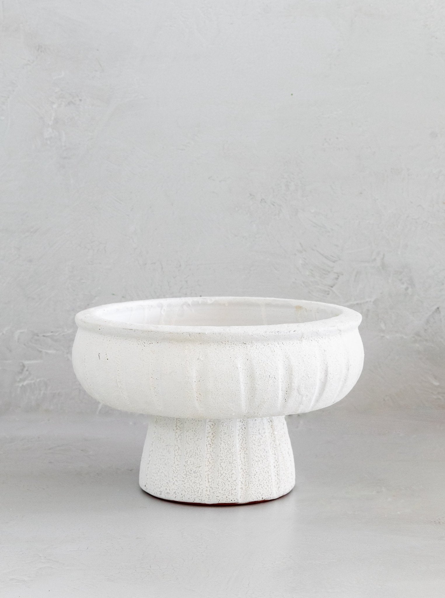 Coupe sur pied en plâtre